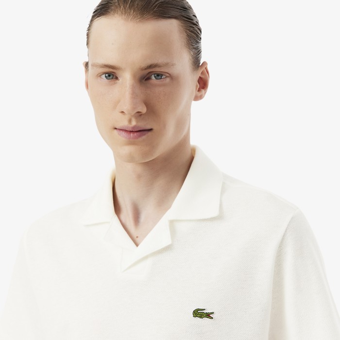 мужское хлопковое поло  из смеси льна от бренда lacoste вид слева