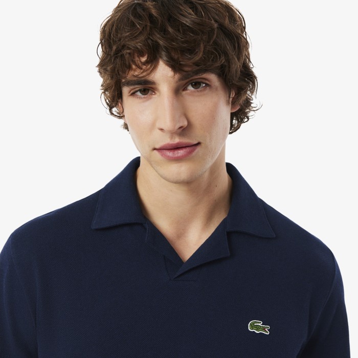 мужское хлопковое поло  из смеси льна от бренда lacoste вид слева
