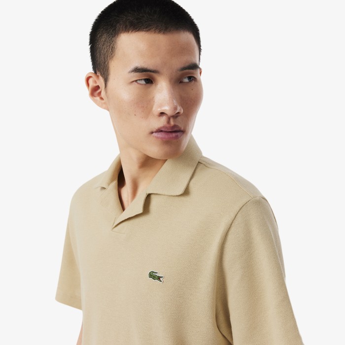 мужское хлопковое поло  из смеси льна от бренда lacoste вид слева
