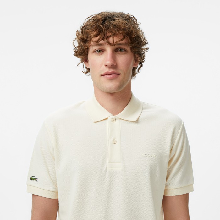 мужское хлопковое поло  от бренда lacoste вид слева