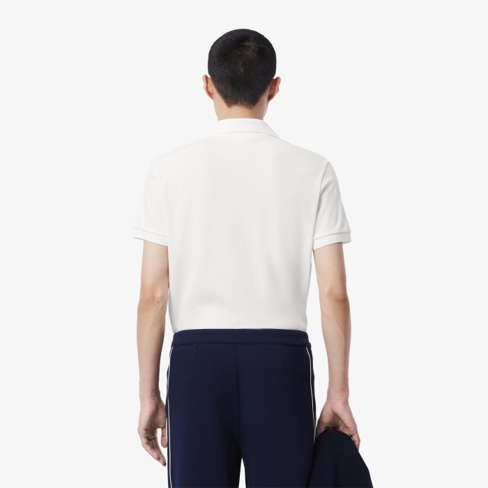 мужское поло  из эластичного органического хлопка от бренда lacoste вид слева