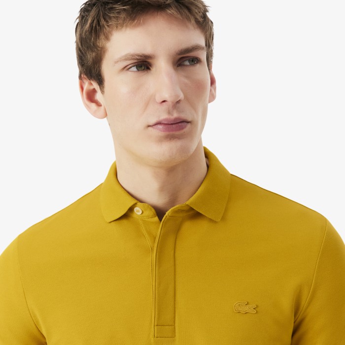 мужское поло  прямого кроя от бренда lacoste вид слева