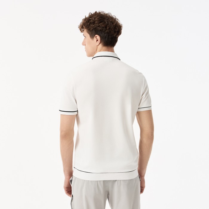 мужское поло  стандартного кроя от бренда lacoste вид слева
