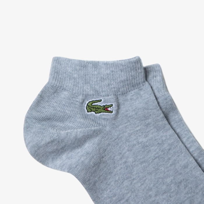 носки  для спорта унисекс, 3 пары от бренда lacoste вид слева