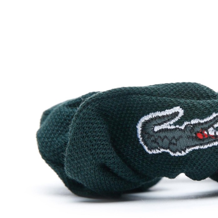 резинка для волос  от бренда lacoste вид слева