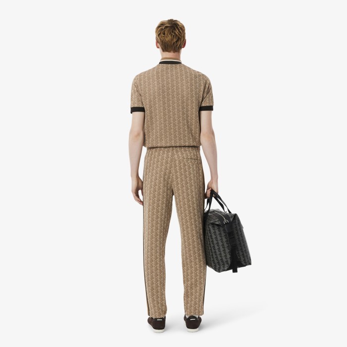спортивные брюки  paris стандартного кроя с монограммой от бренда lacoste вид слева
