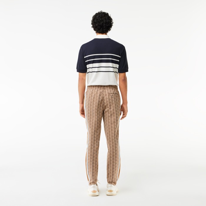 спортивные брюки  paris стандартного кроя с монограммой от бренда lacoste вид слева