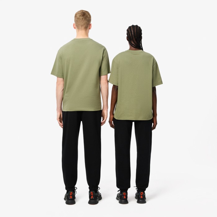 спортивные брюки  унисекс от бренда lacoste вид слева