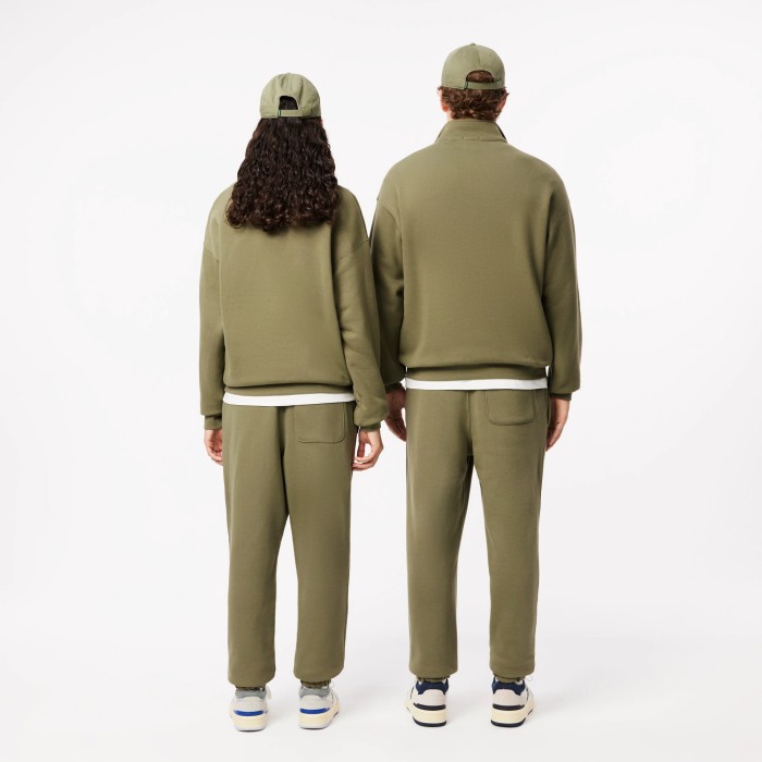 спортивные брюки  унисекс от бренда lacoste вид слева