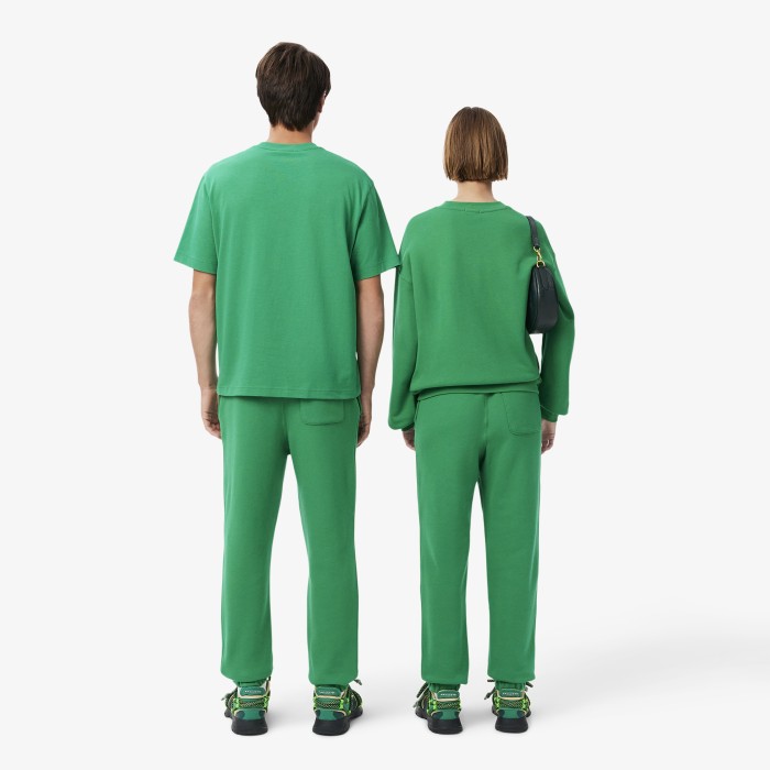спортивные брюки  унисекс от бренда lacoste вид слева