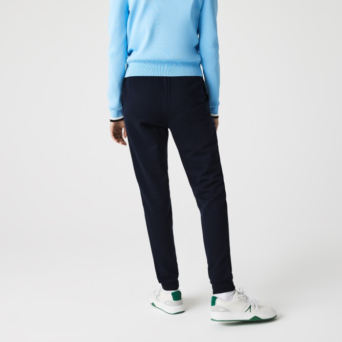 спортивные брюки  от бренда lacoste вид слева