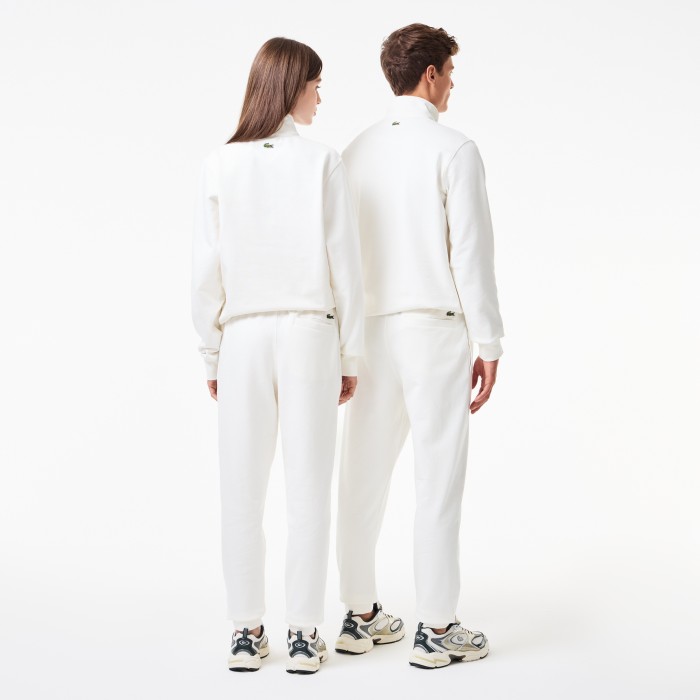 спортивные хлопковые брюки  унисекс от бренда lacoste вид слева