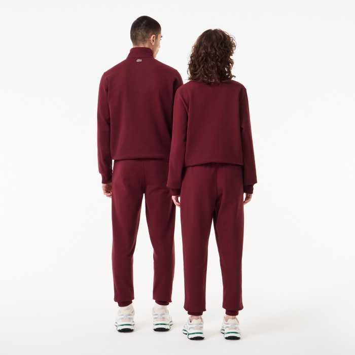 спортивные хлопковые брюки  унисекс от бренда lacoste вид слева