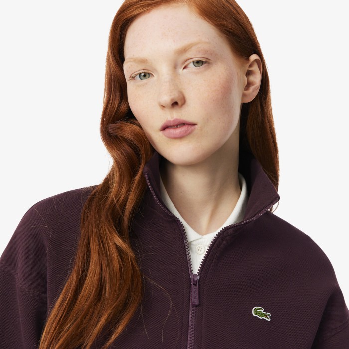 свитшот  из пике на молнии с высоким воротником от бренда lacoste вид слева