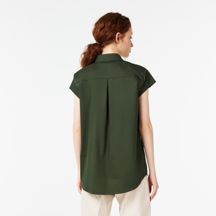 женская блузка  свободного кроя от бренда lacoste вид слева