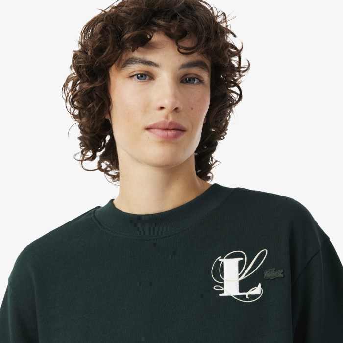 женская футболка  свободного кроя от бренда lacoste вид слева