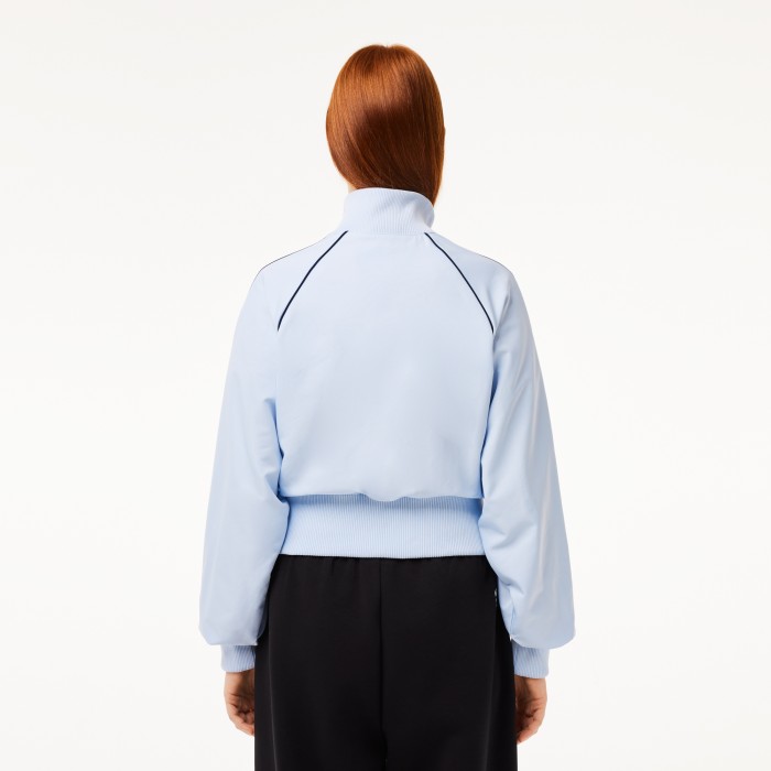 женская короткая спортивная куртка  свободного кроя от бренда lacoste вид слева