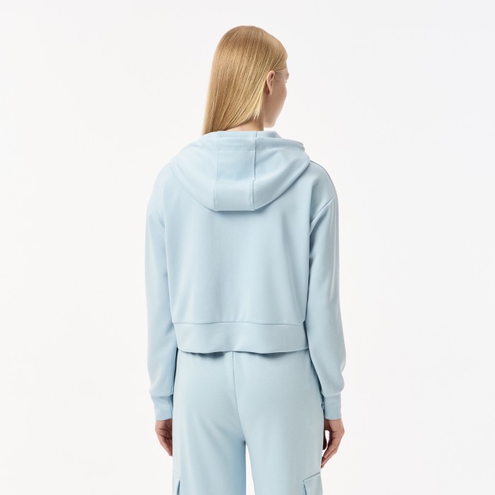 женская короткая толстовка  с капюшоном от бренда lacoste вид слева