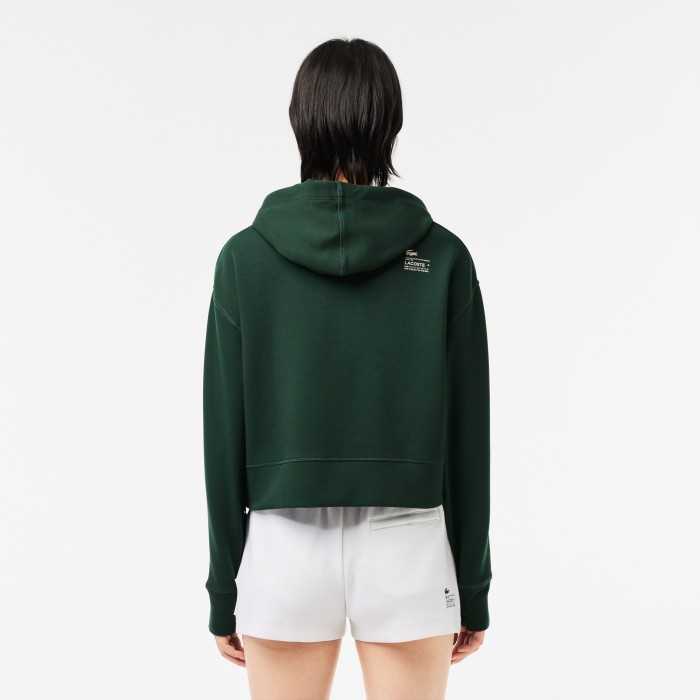 женская толстовка  свободного кроя с капюшоном от бренда lacoste вид слева