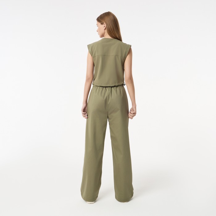 женские брюки  из эластичного хлопка от бренда lacoste вид слева