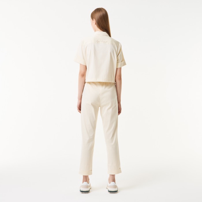 женские брюки  стандартного кроя с регулируемым поясом от бренда lacoste вид слева