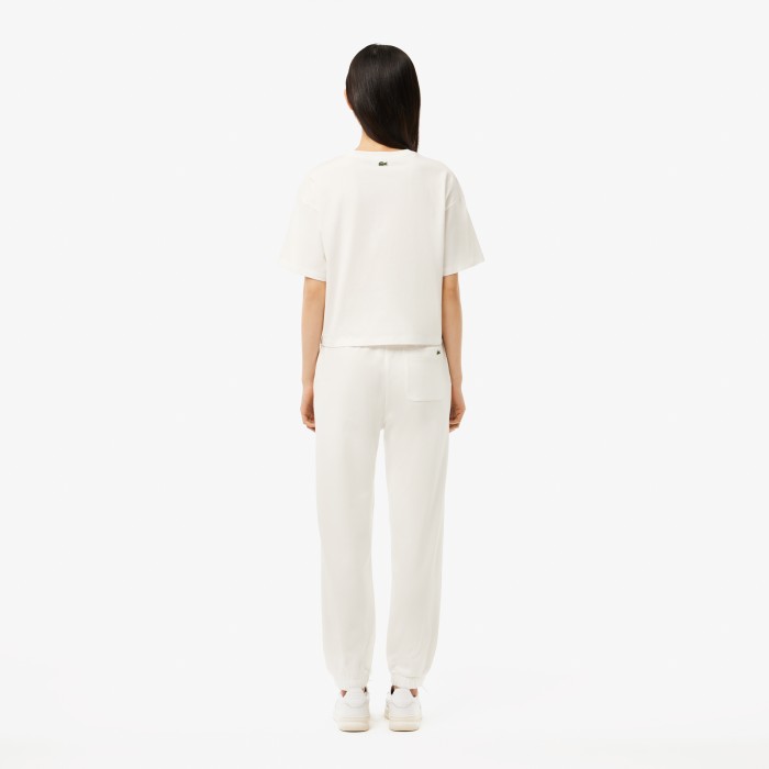 женские флисовые спортивные брюки  от бренда lacoste вид слева