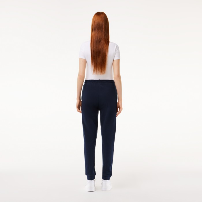 женские флисовые спортивные брюки  от бренда lacoste вид слева