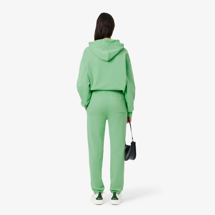 женские флисовые спортивные брюки  от бренда lacoste вид слева