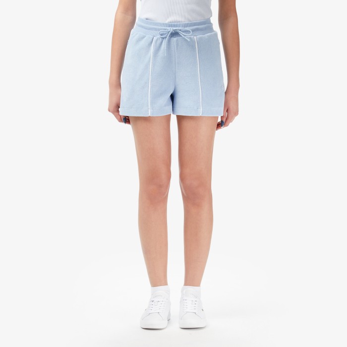 женские хлопковые шорты  от бренда lacoste вид слева