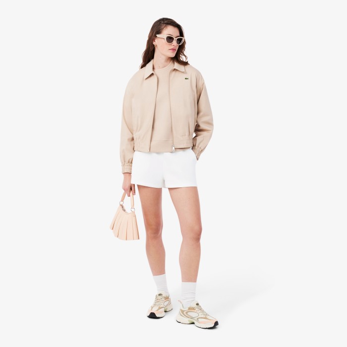 женские короткие шорты  core active от бренда lacoste вид слева
