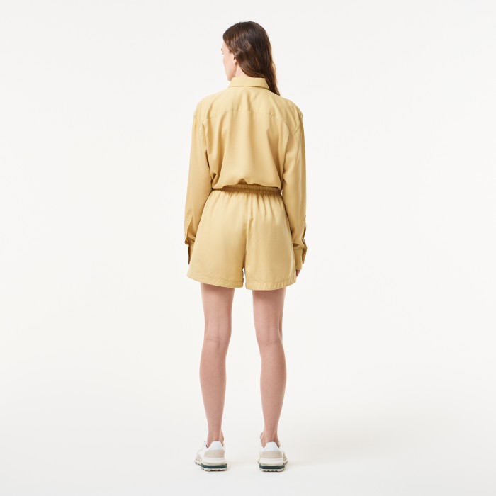 женские легкие шорты  от бренда lacoste вид слева