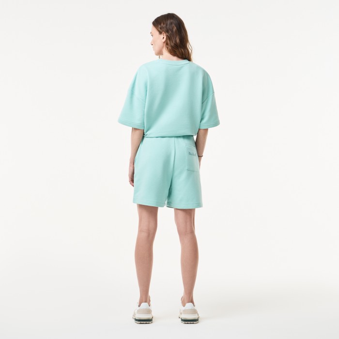 женские шорты  свободного кроя от бренда lacoste вид слева