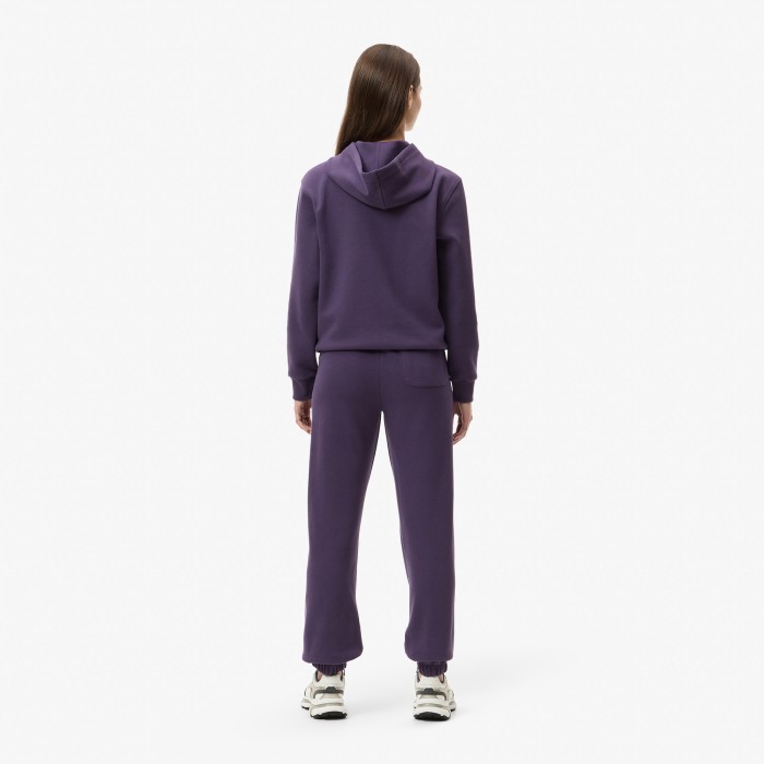 женские спортивные брюки  из органического хлопка от бренда lacoste вид слева