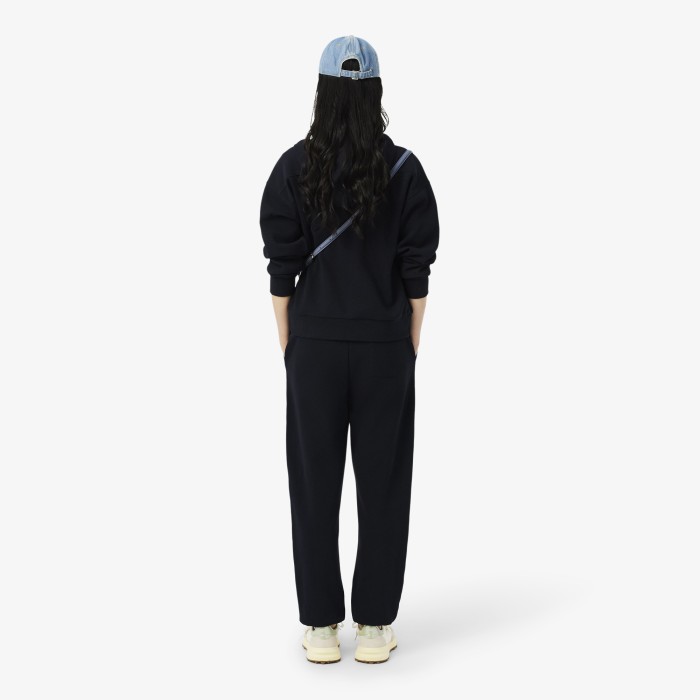 женские спортивные брюки  из органического хлопка от бренда lacoste вид слева
