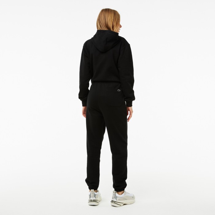 женские спортивные брюки  jogger fit от бренда lacoste вид слева