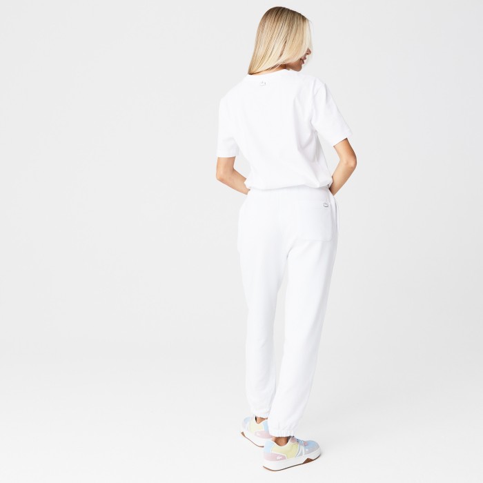 женские спортивные брюки  jogger fit от бренда lacoste вид слева