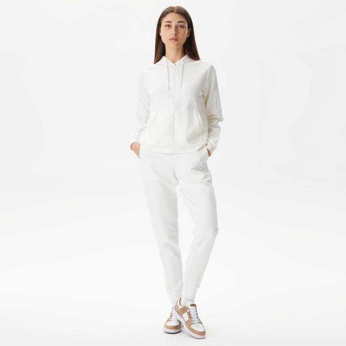 женские спортивные брюки  ribbed woven от бренда lacoste вид слева