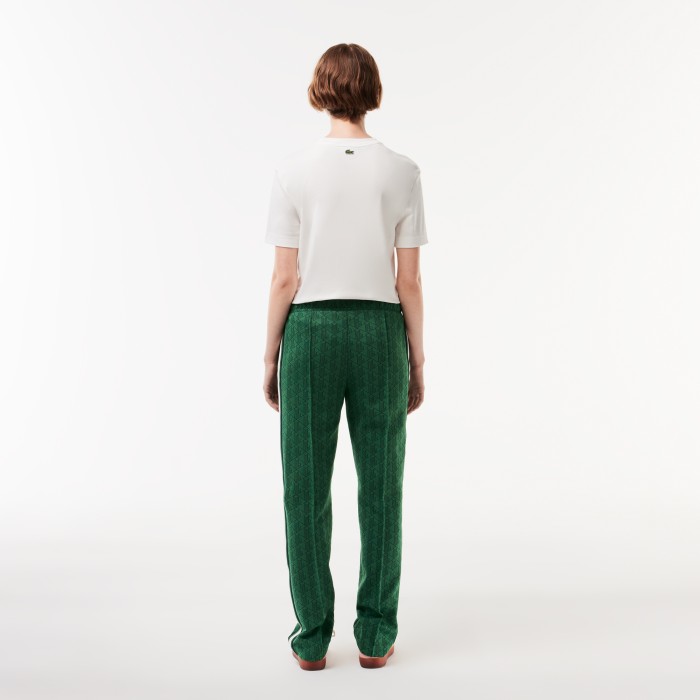 женские спортивные брюки  от бренда lacoste вид слева