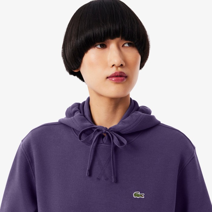 женский свитшот  от бренда lacoste вид слева