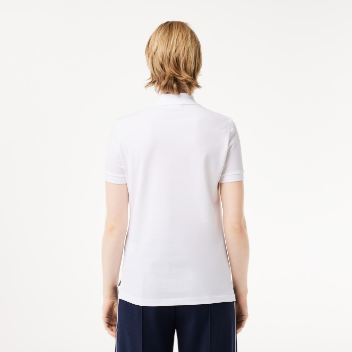 женское поло  классического кроя из хлопка пике от бренда lacoste вид слева