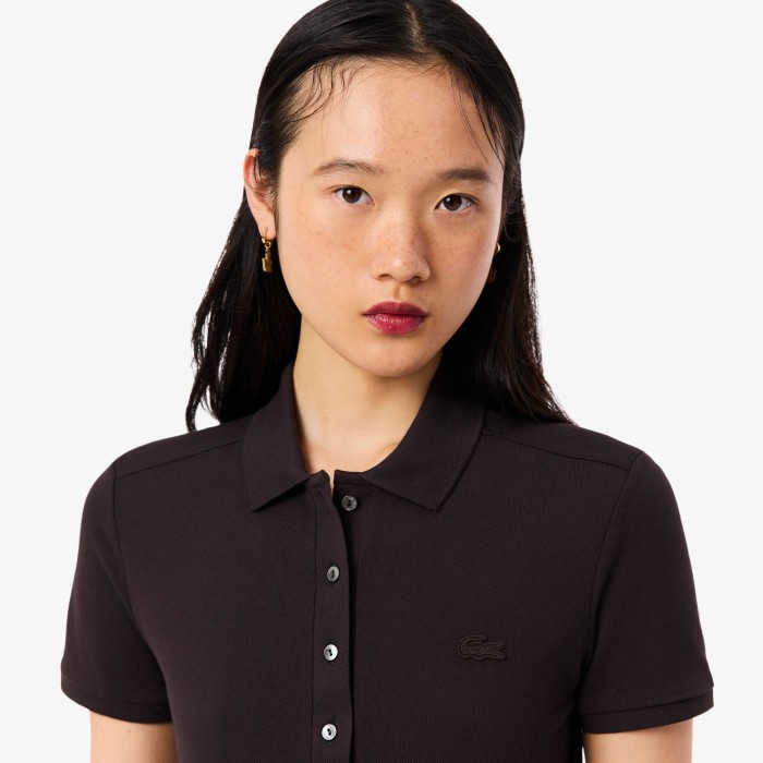 женское поло  приталенного кроя из эластичного хлопка от бренда lacoste вид слева
