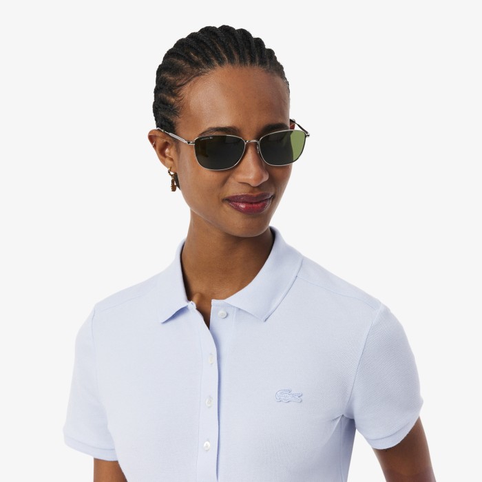 женское поло  приталенного кроя из эластичного хлопка от бренда lacoste вид слева