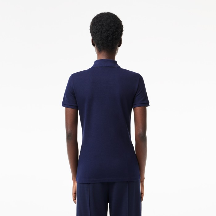 женское поло  приталенного кроя из эластичного хлопка от бренда lacoste вид слева