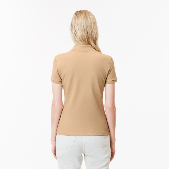 женское поло  приталенного кроя из эластичного хлопка от бренда lacoste вид слева