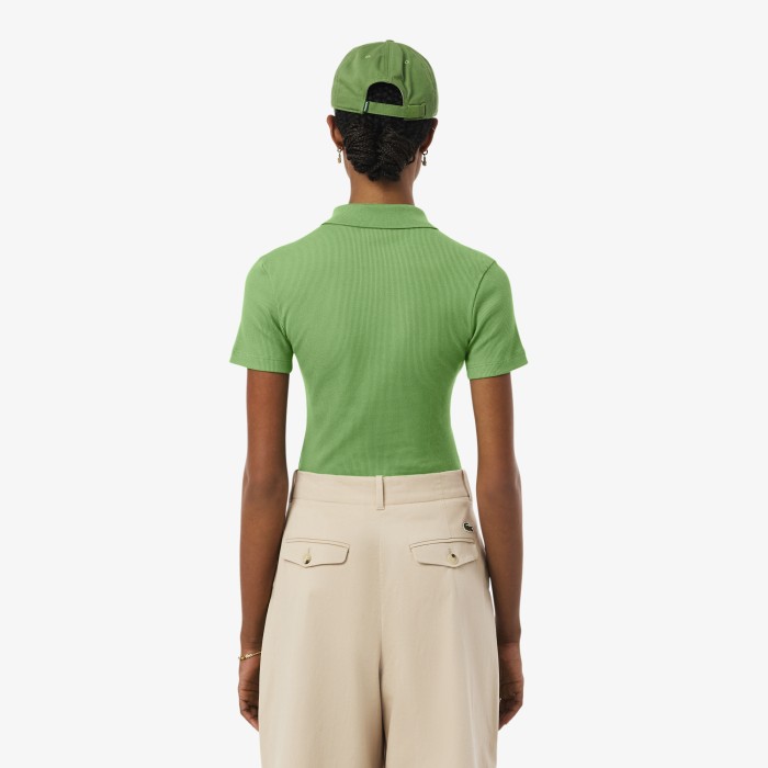 женское поло  приталенного кроя из органического хлопка от бренда lacoste вид слева