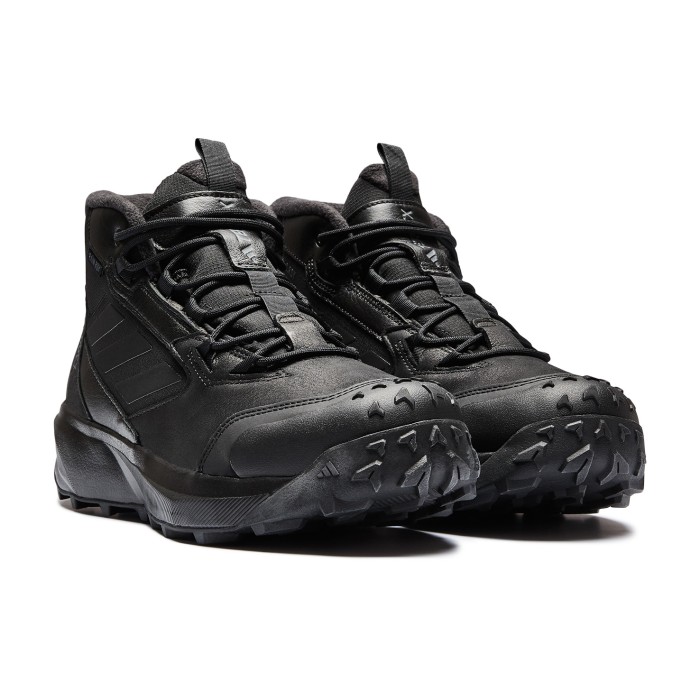 ботинки terrex winter boot mid leather от бренда adidas вид слева
