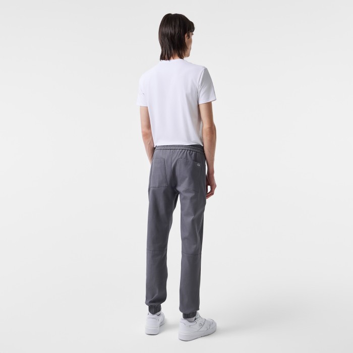 брюки jogger fit от бренда lacoste вид слева
