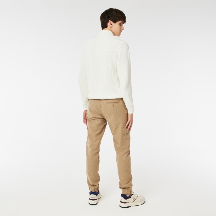 брюки jogger fit от бренда lacoste вид слева