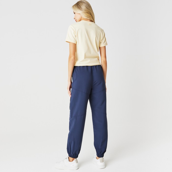 брюки jogger fit от бренда lacoste вид слева