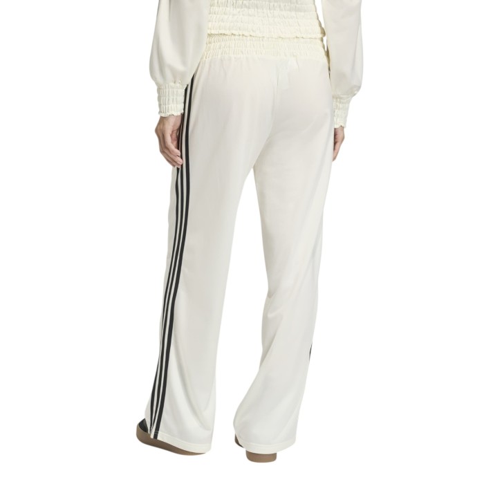 брюки smocked firebird track top от бренда adidas вид слева